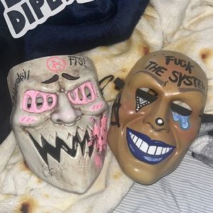 two masks from spirit Halloween, that I painted myself